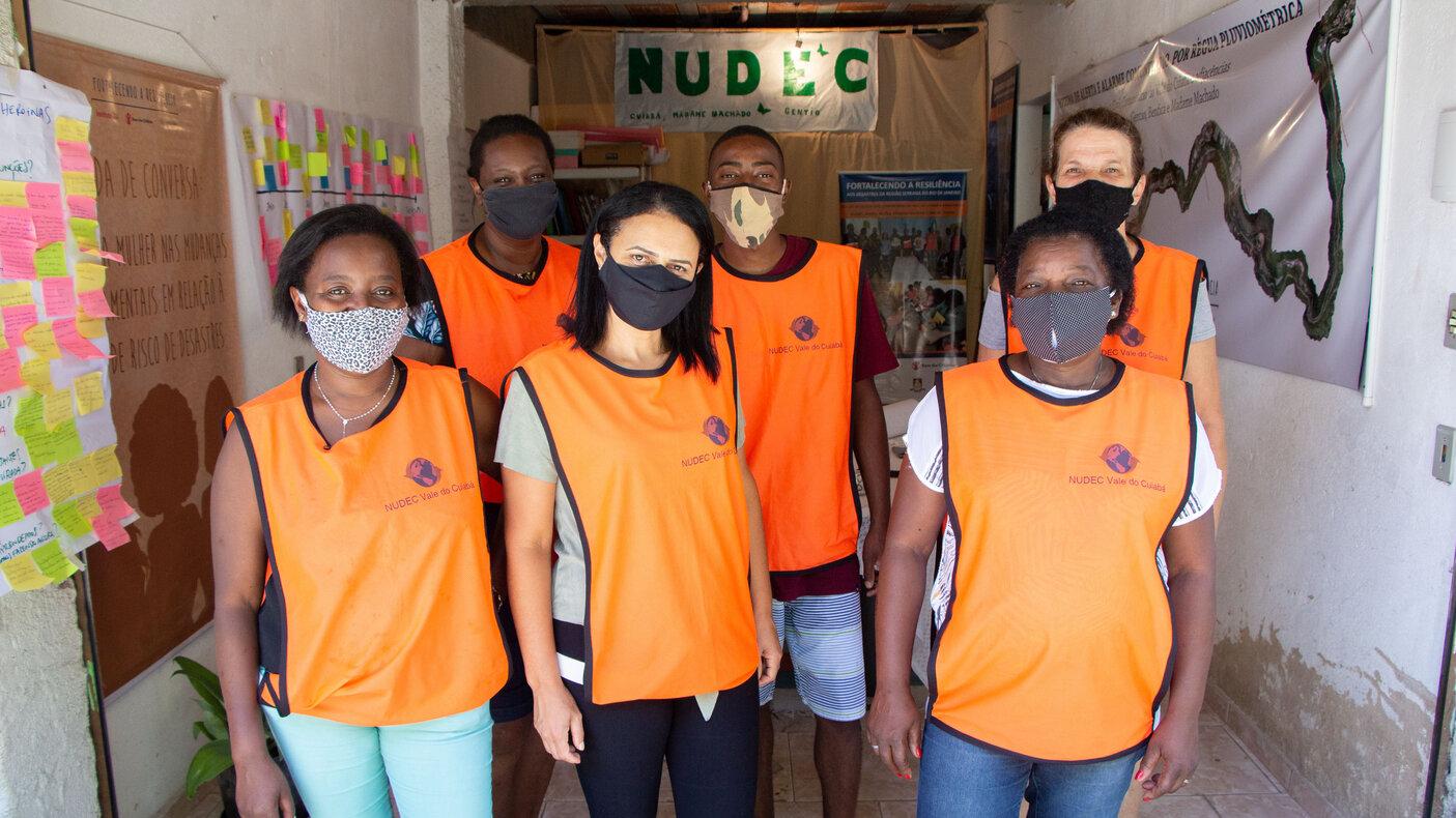 Women wearing orange vests