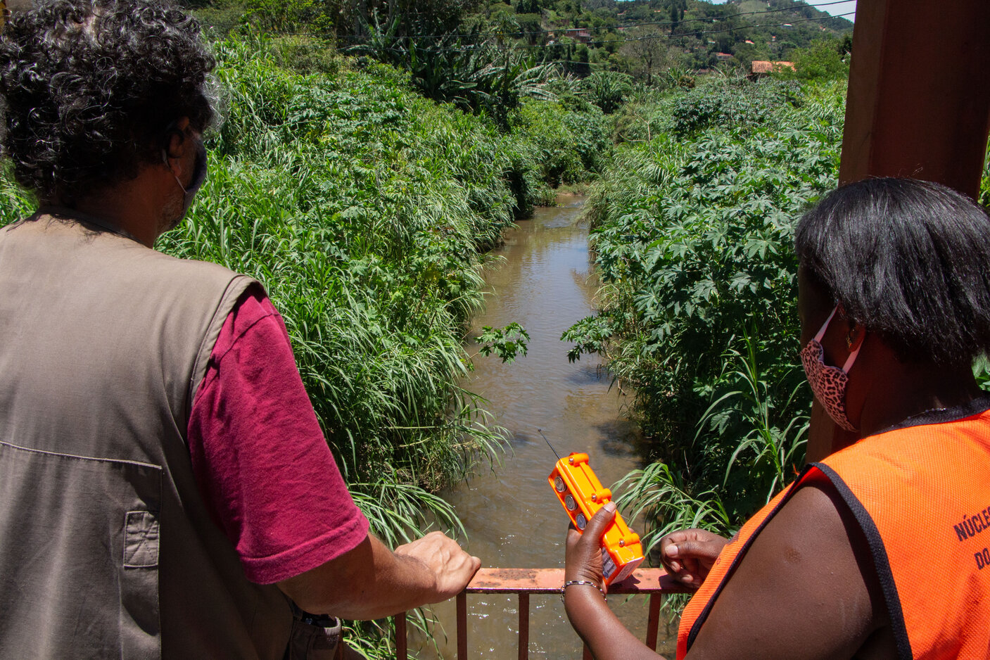 Two women looking at a river