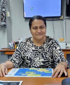 Ms. Vasiti Soko at her desk in her office