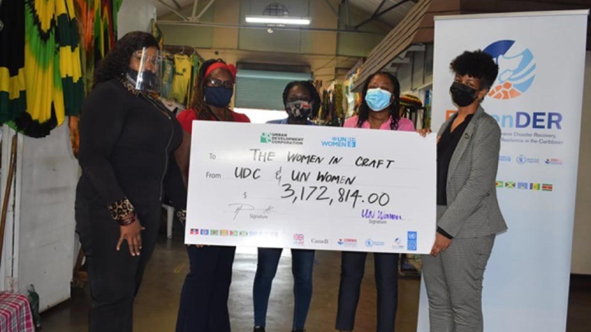 Women and a giant cheque